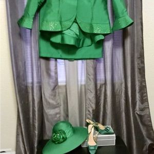 Skirt and matching jacket with accessories.